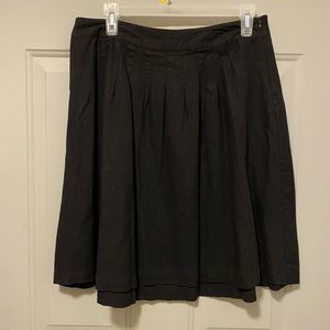 Cute black skirt.